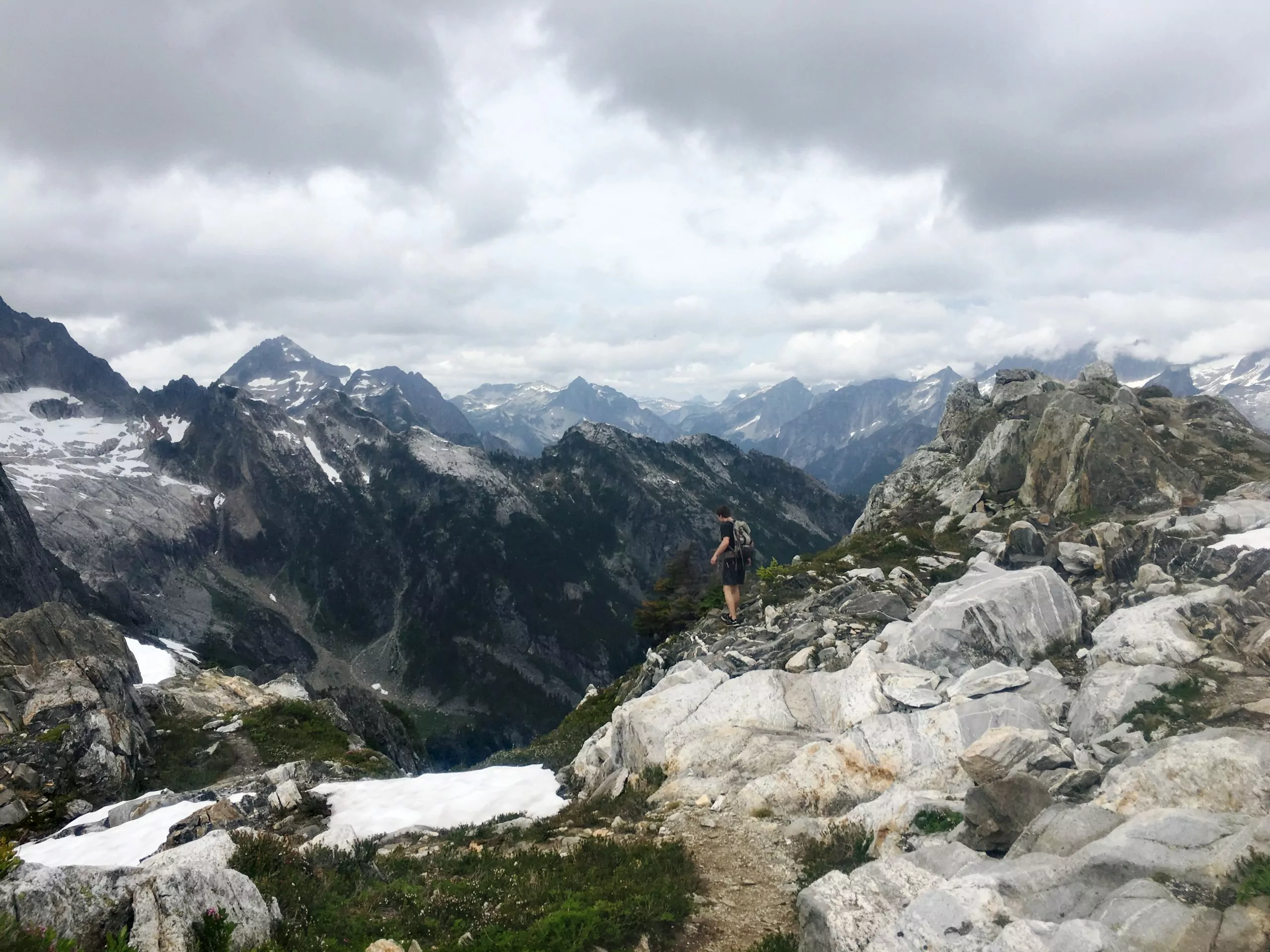 Majestic Mountain Peak: Snow-capped Summit and Rugged Trail 