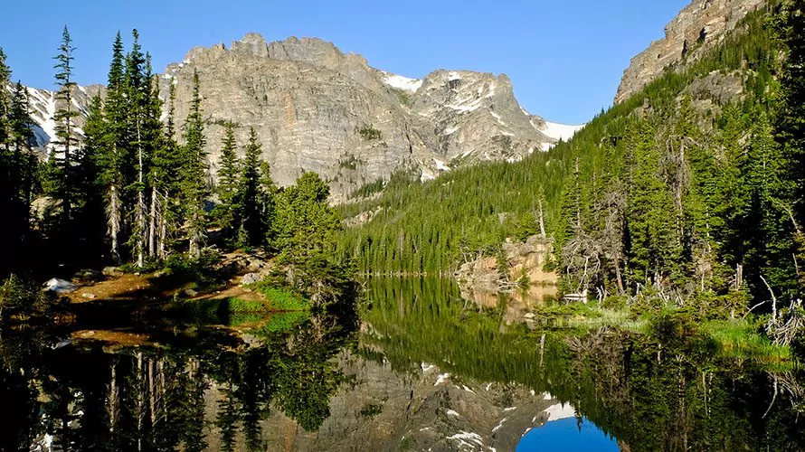 Natural serenity at it's best in Rocky Mountain National Park with alpine lakes, lush wooded forests and granite peaks.