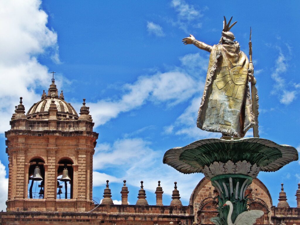 Local Woman with her Baby Llama in Cusco - Picture of Evolution