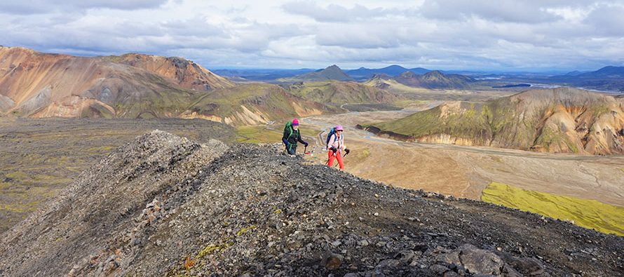 Hikers on rocky landscape in Iceland