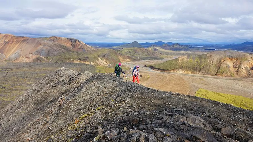 Hikers on rocky landscape in Iceland