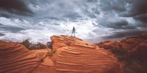 Woman standing on cliff