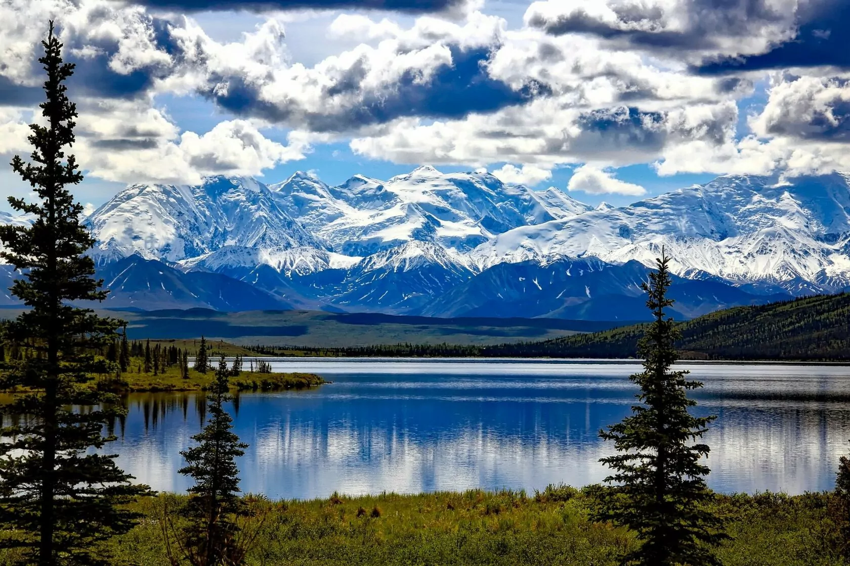 Denali National park, best national park backpacking trips in the US, guided hiking vacations, wilderness, alaska, Denali national park, mountains, snow, clouds