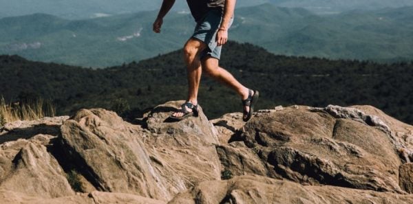 Man running on rugged trail