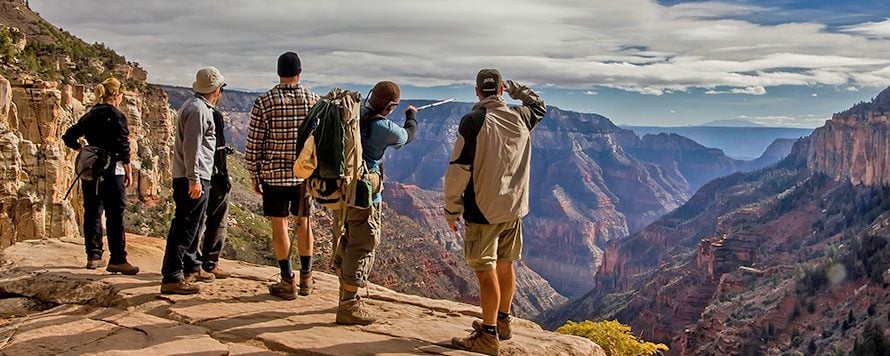 Hikers overlooking north rim