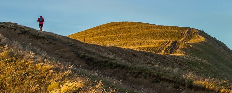 Man trekking through mountains