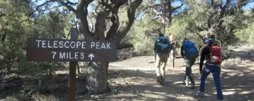 Telescope Peak sign and hikers