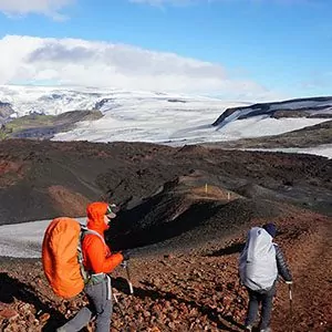 Hikers on path with glaciers