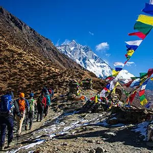 Hikers in Nepal with colorful flags