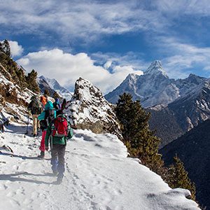 Hikers on snowy Nepal mountain