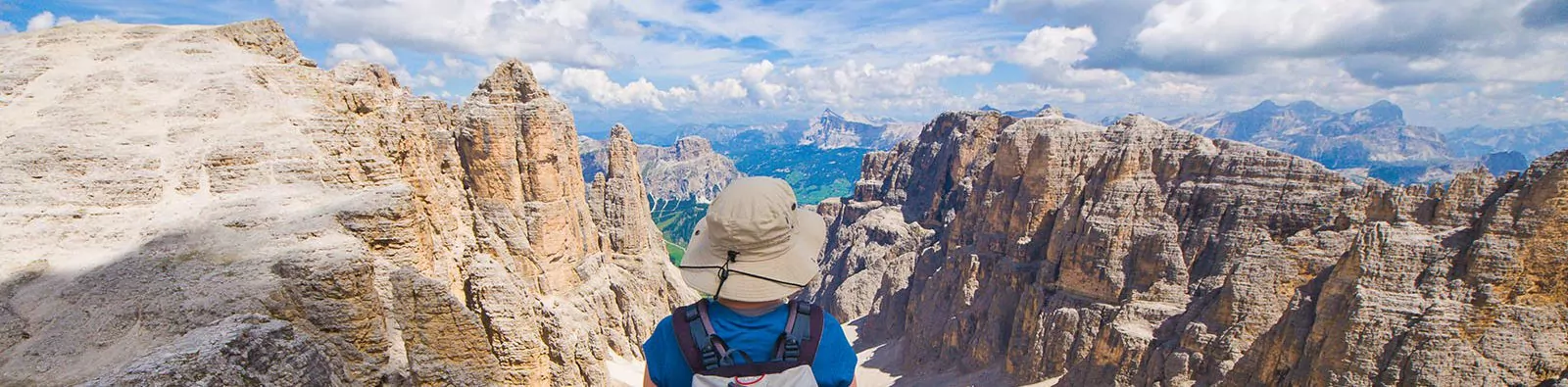 Hiker looking out at the Italian Dolomites