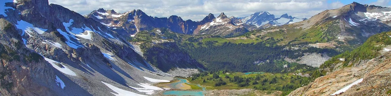 Wide image of alpine lakes and glaciers of North Cascades National Park