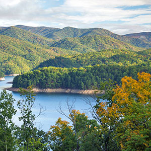 Spring time in the Great Smoky Mountains offers beautiful sunlight, lush forests, and bold lakes.