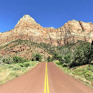 Zion sunshine sandstone green lush road travel backpack hike