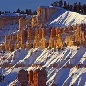 Beautiful lighting on the snow covered rock formations in Bryce Canyon