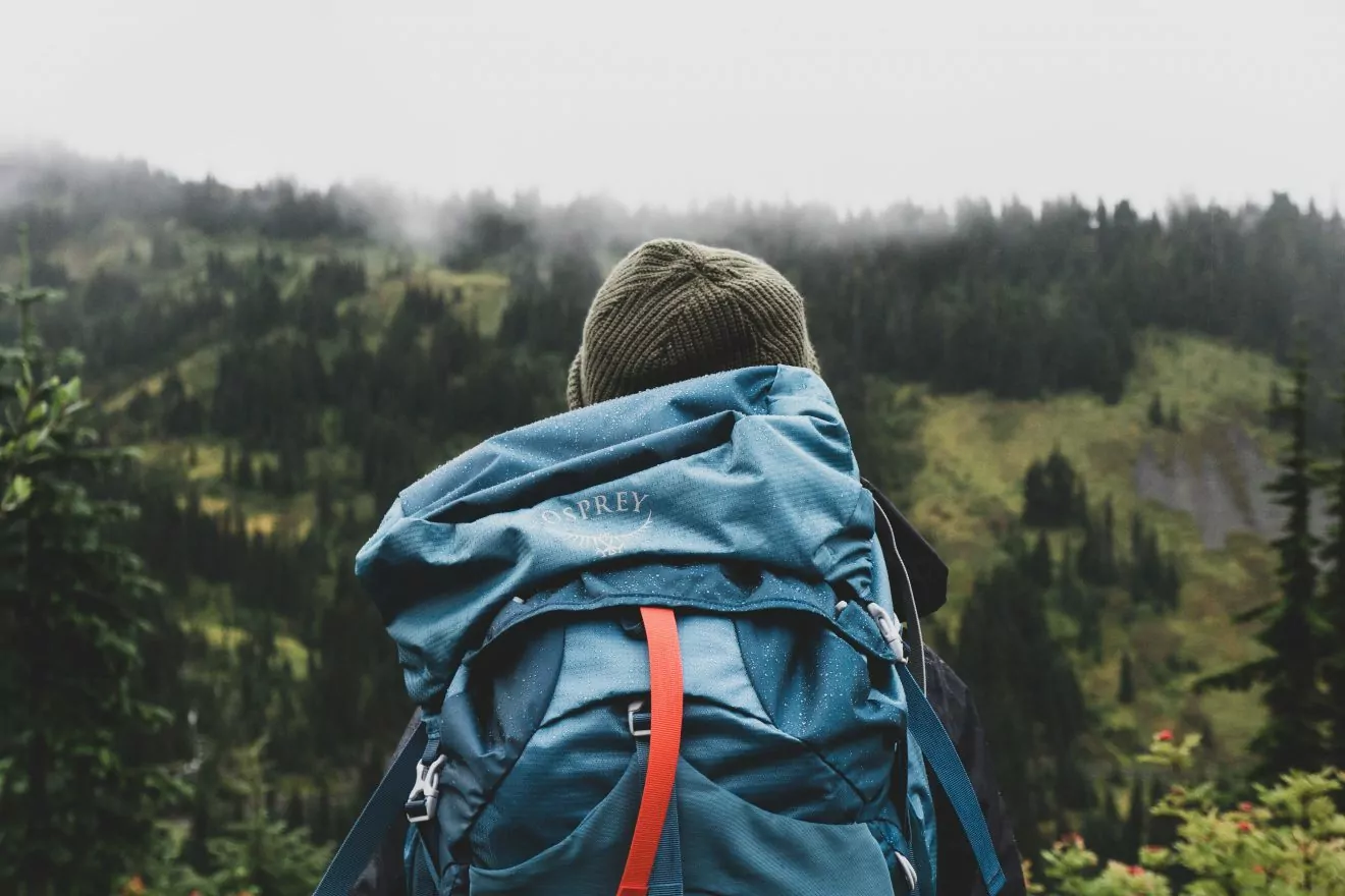 hiker with backpack, training for elevation gain