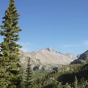 Clear blue bird skies amongst barren mountains in Rocky Mountain National Park