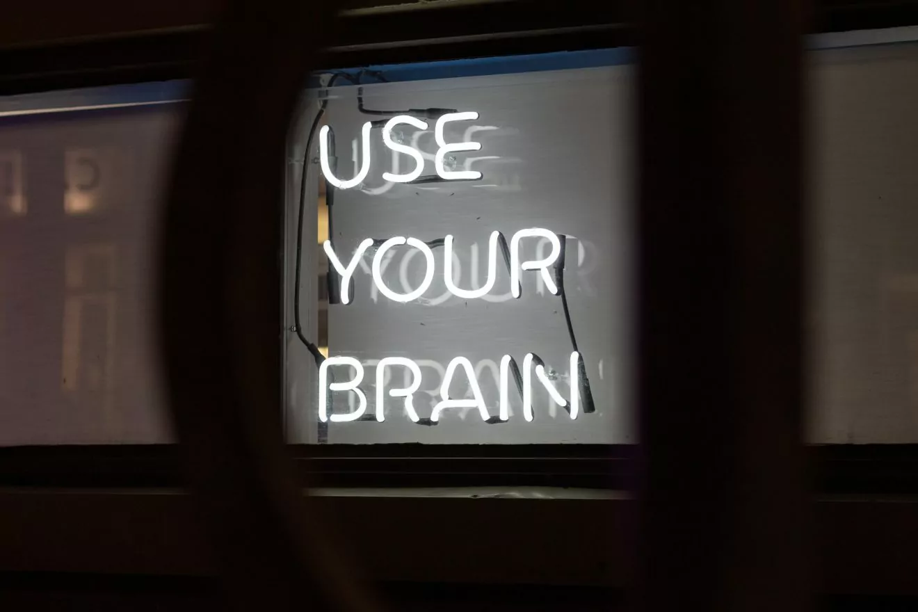 neon "use your brain" sign