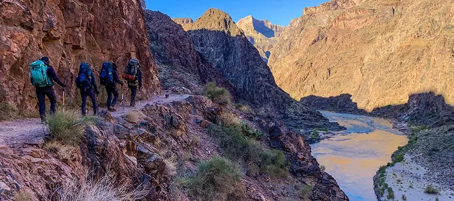 Backpackers hiking toward the bottom of the grand canyon