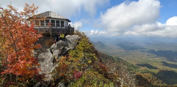Smoky Mountain fire tower hikers rest in autumn