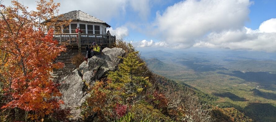 Smoky Mountain fire tower hikers rest in autumn