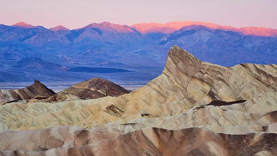 sunrise over the desert hills of Death Valley National Park