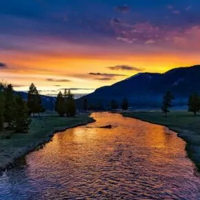 backpacking yellowstone in june river sunset mountains