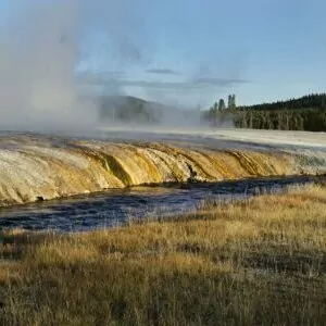 Yellowstone in October hot springs river swim steam chilly rock grass 