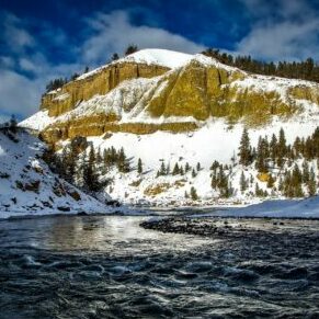 Yellowstone in May backpacking river mountain snow ice water