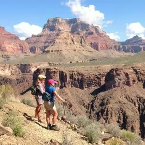 Grand Canyon in August backpack hike guided tour women cliff ledge hike canyon