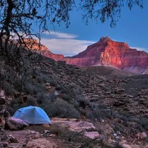Grand Canyon in December backpacking guided tours tent cliff rock trees