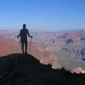 Grand Canyon July hiker backpack camp cliff shadow hiking poles