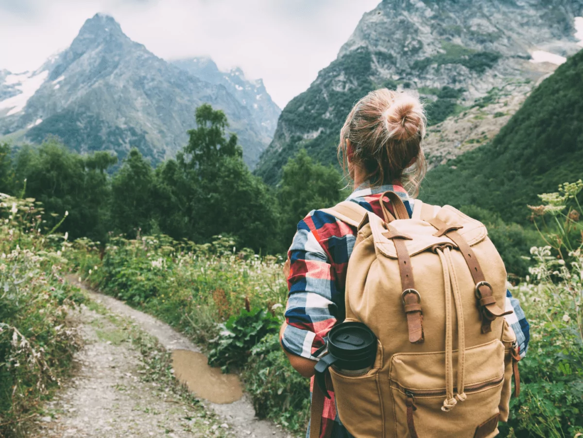 Female Solo Hiker on the trail enjoying the views