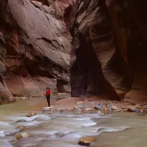 Zion in September backpacking narrows river canyon woman 