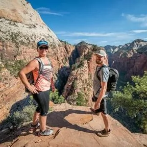 Zion in June cliff hike hikers summer rock desert