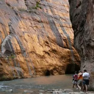Zion in June Narrows hikers slot canyon river
