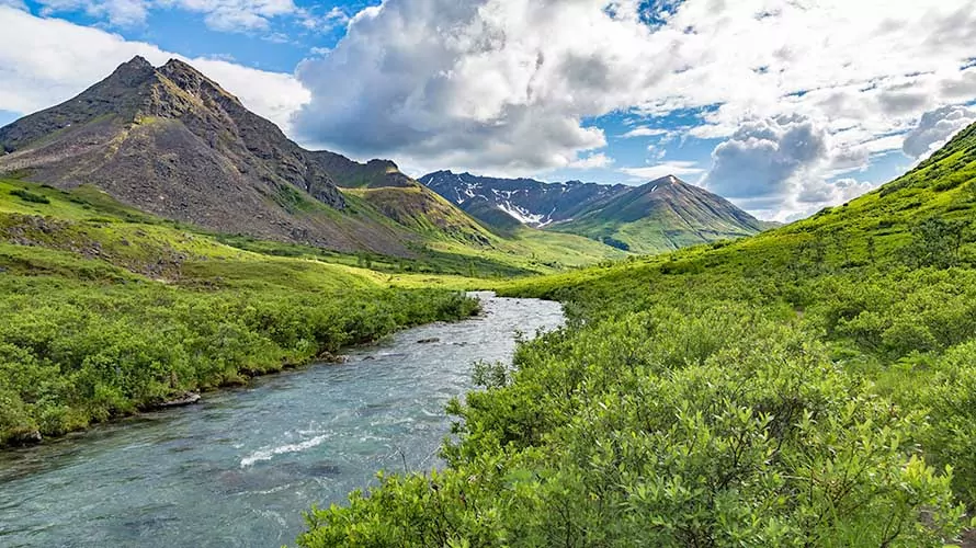 The Little Susitna River surrounded by mountains in Hatcher Pass, Alaska - as seen from the Gold Mint Trail.