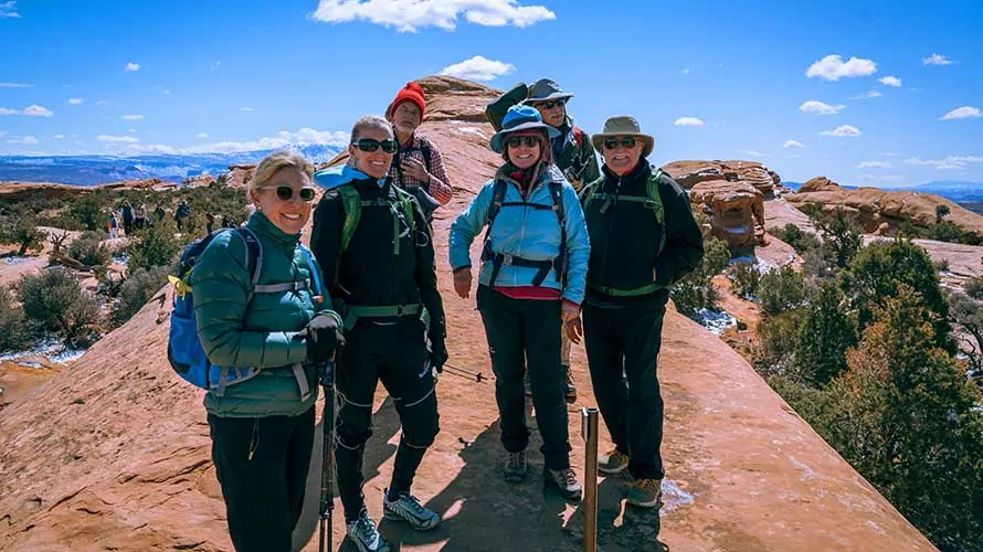 Group of hikers on the Devils Garden Trail in Arches National Park, Utah