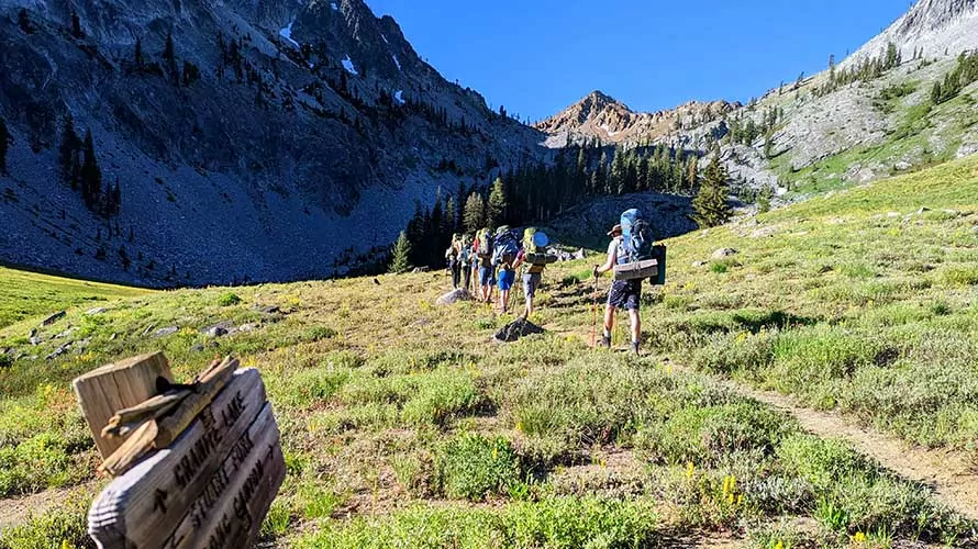 Group of backpackers hiking in the Trinity Alps Wilderness, Shasta National Forest