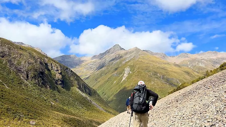 Hiker on a New Zealand hiking tour with Wildland Trekking