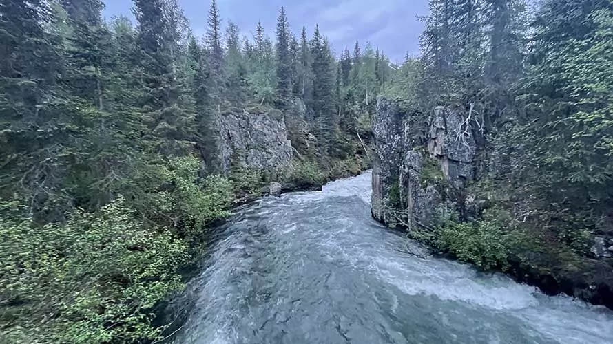 Pristine, glacial-fed river in the Kenai Range, Alaska
