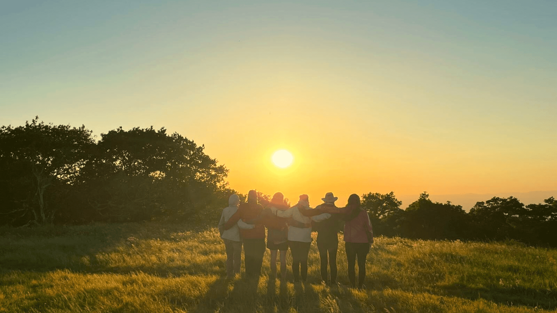 Women embrace in friendship