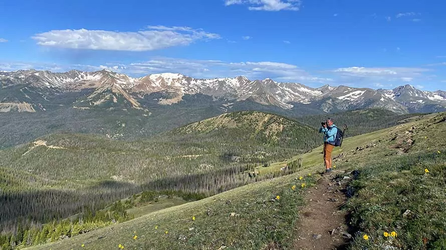 Photographer capturing alpine magic in Rocky Mountain National Park, Colorado