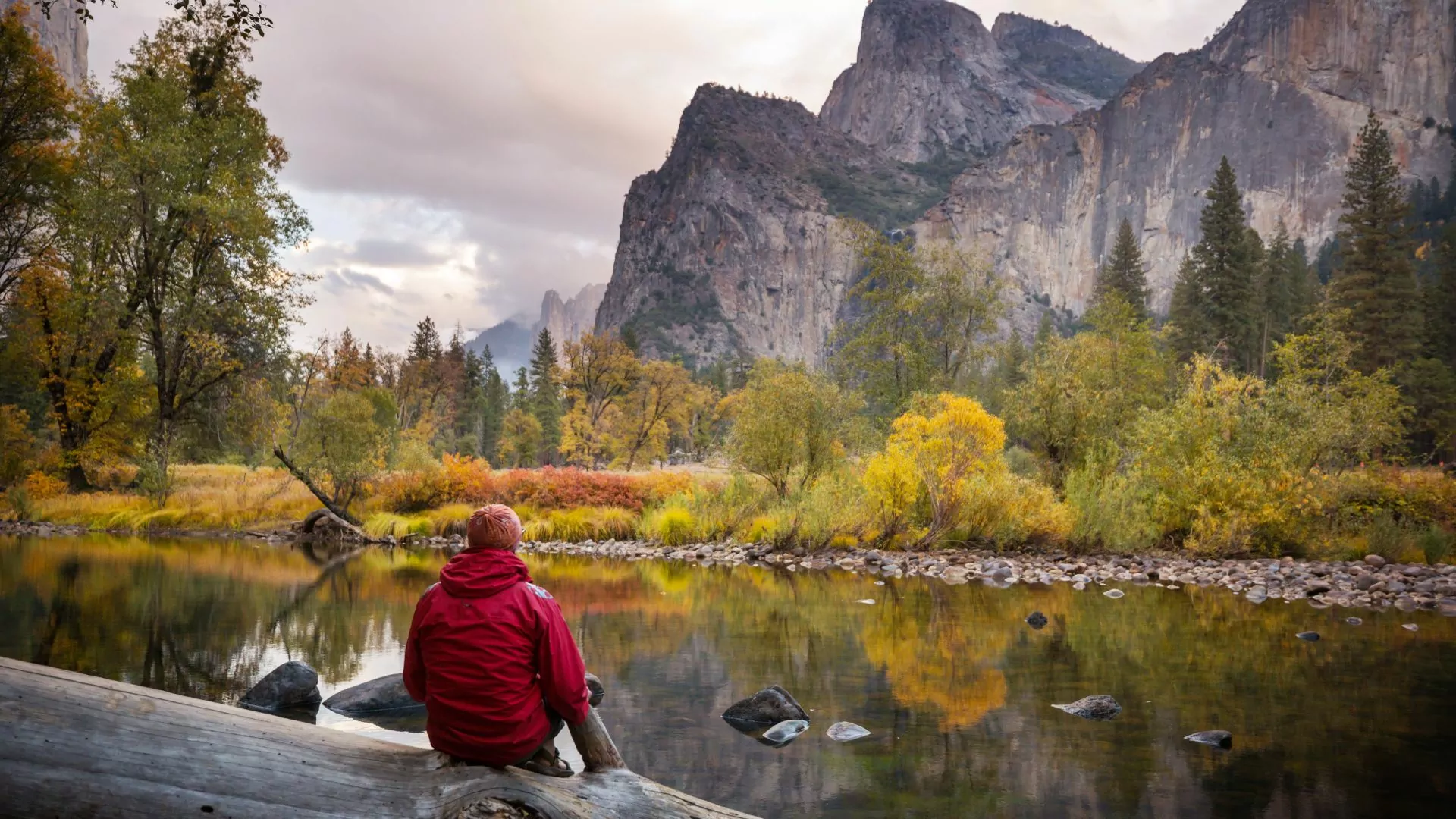 A visitor enjoys views of Yosemite National Park