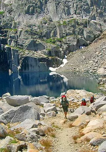 Alpine Lake and hikers in Sequoia National Park
