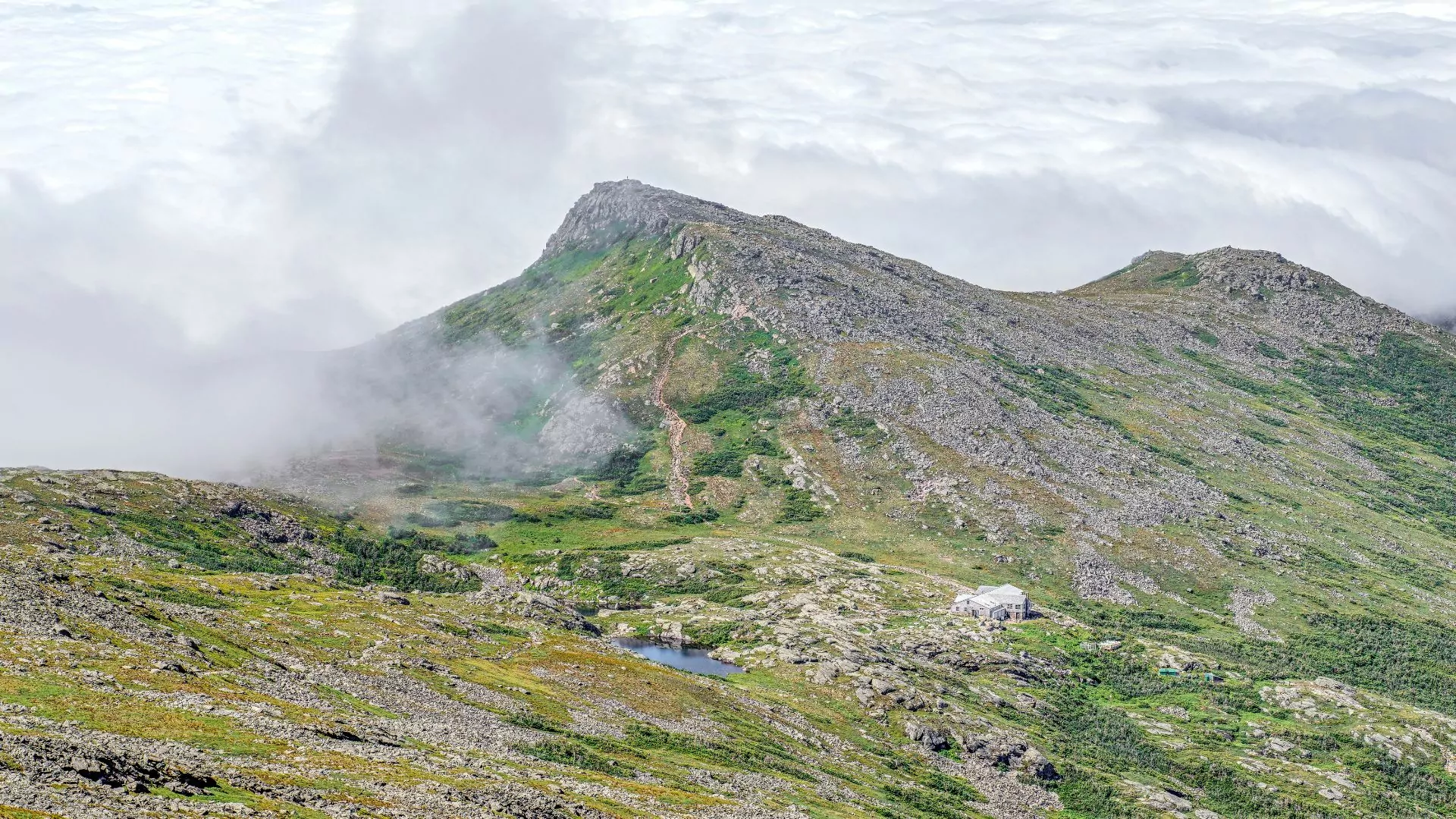 An Appalachian Mountan Club hut sits on the slopes of the Presidential traverse in the White Mountains of New Hampshire