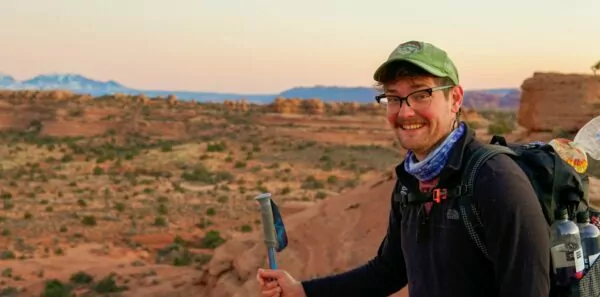 Wildland guide and blog contributor Austin B. stands in front of Utah's high desert