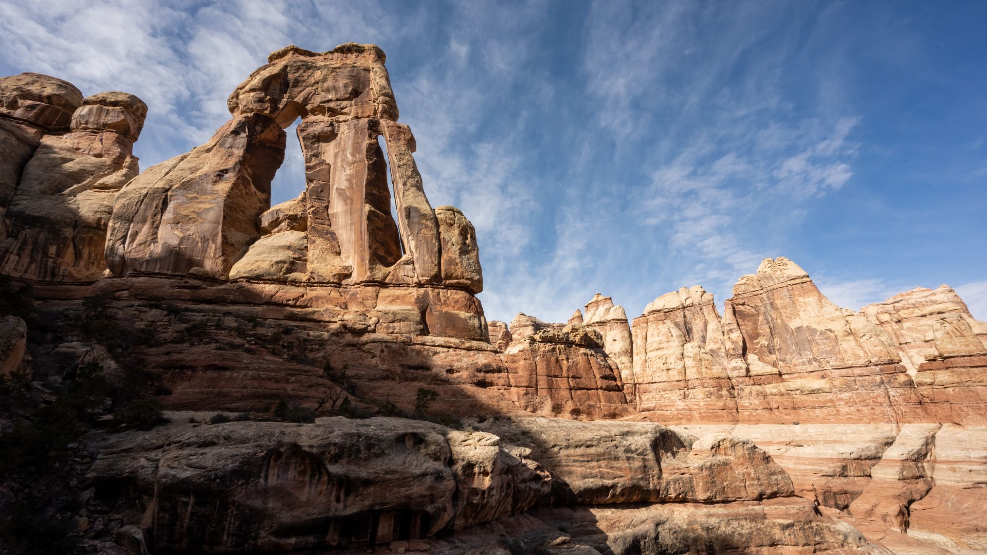 The Druid Arch in stands tall in the Needles District of Canyonlands National Park