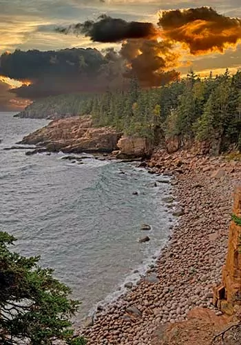 The Ocean Path Trail meanders along vast slabs of pink granite, picturesque cliffs, and breathtaking oceans views of the striking coast of Maine. The Ocean Path is a great way to access Thunder Hole and Otter Point from Sand Beach on a gradual hike. This picturesque hike is a great way to experience Acadia National Park.