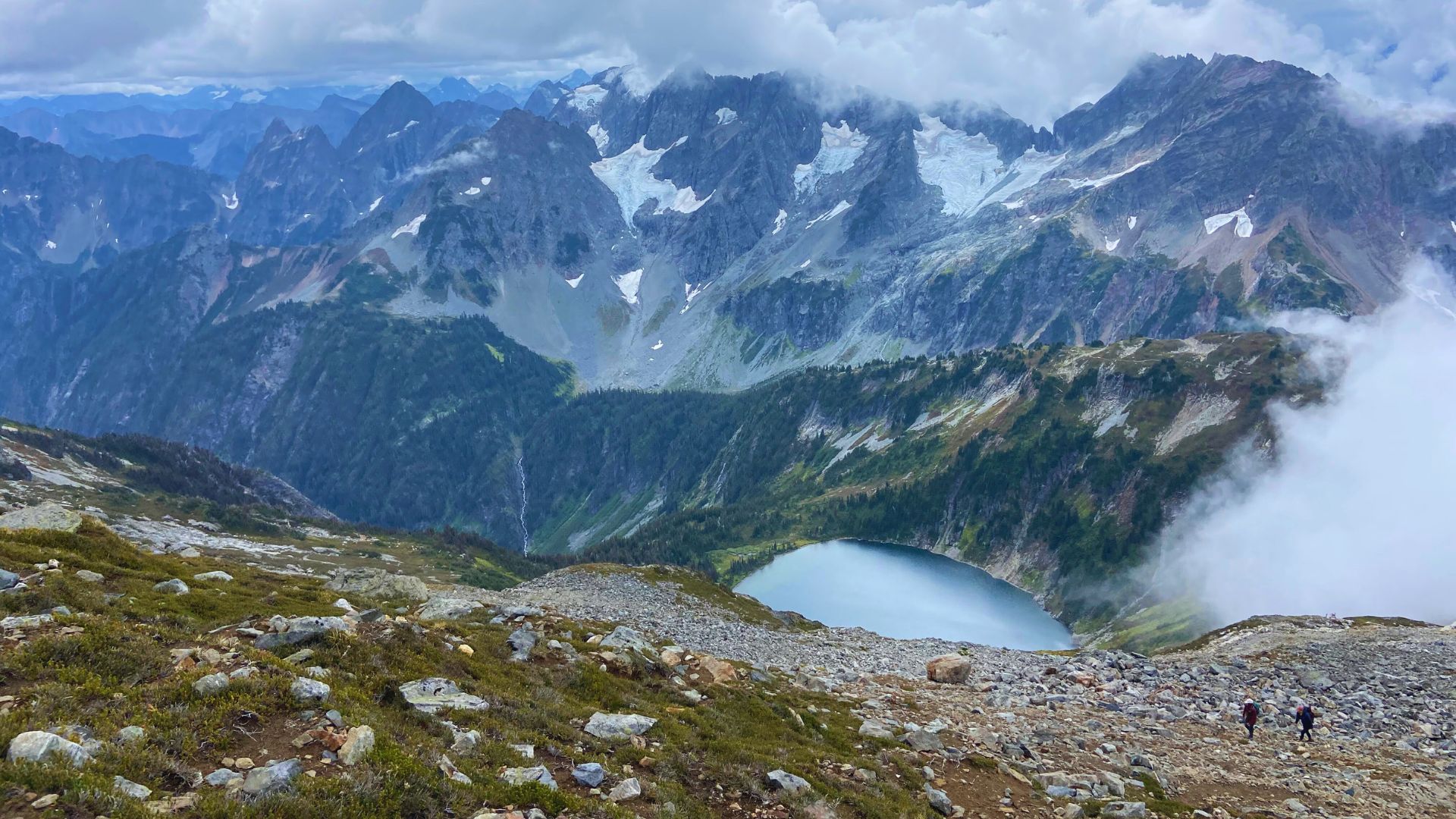 Hikers stroll below the Sahale Glacier camp in North Cascades National Park